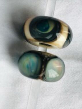 Pair of artisan glass bracelet or dreadlock beads in teal and cream colours